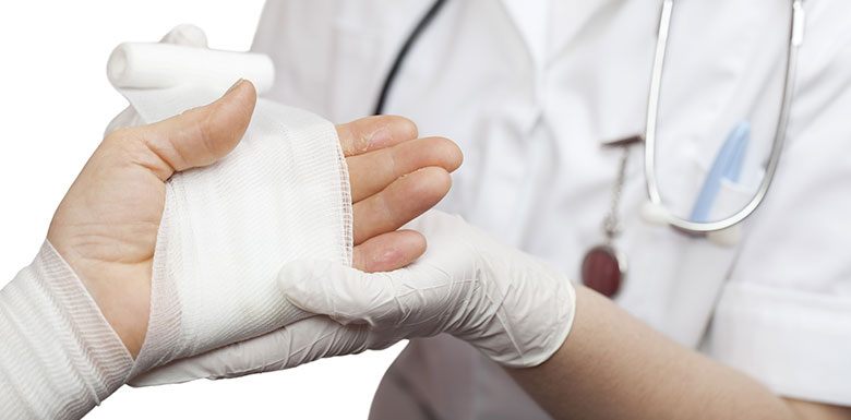 Doctor checking on patient burns